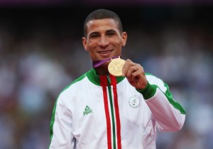 LONDON, ENGLAND - AUGUST 08: Gold medalist Taoufik Makhloufi of Algeria poses on the podium during the medal ceremony for the Men's 1500m on Day 12 of the London 2012 Olympic Games at Olympic Stadium on August 8, 2012 in London, England. (Photo by Quinn Rooney/Getty Images)